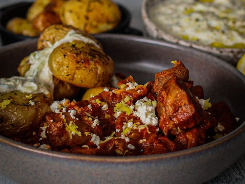 Lamb Stifado with Crushed Herb Potatoes & Tzatziki