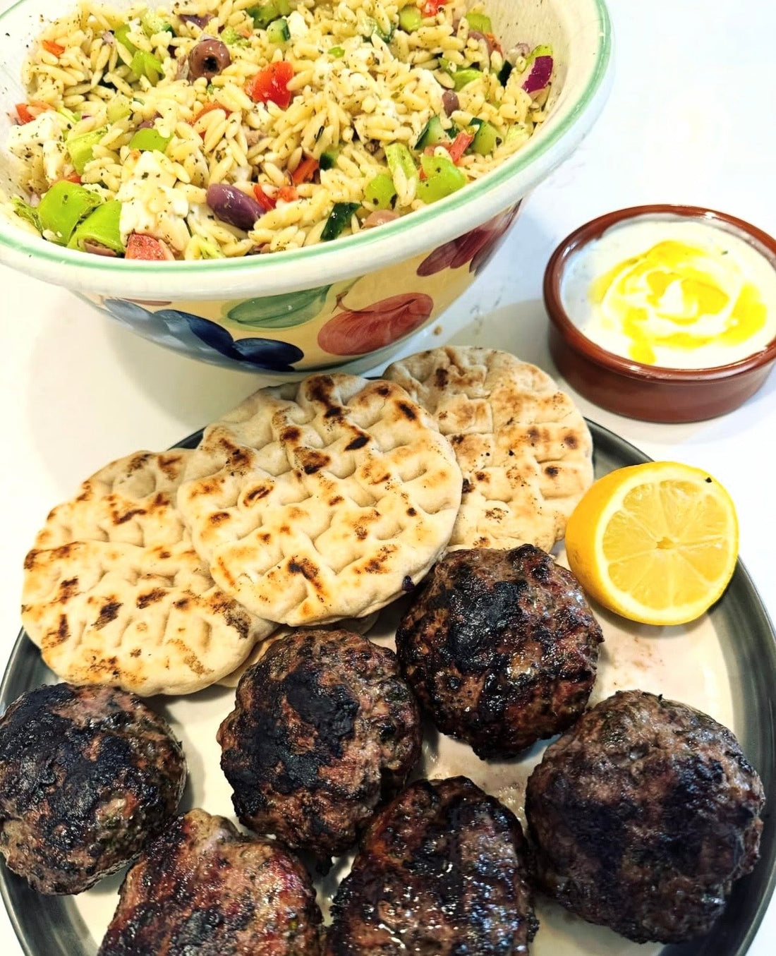 BBQ Organic Lamb Burgers with Greek Salad Orzo