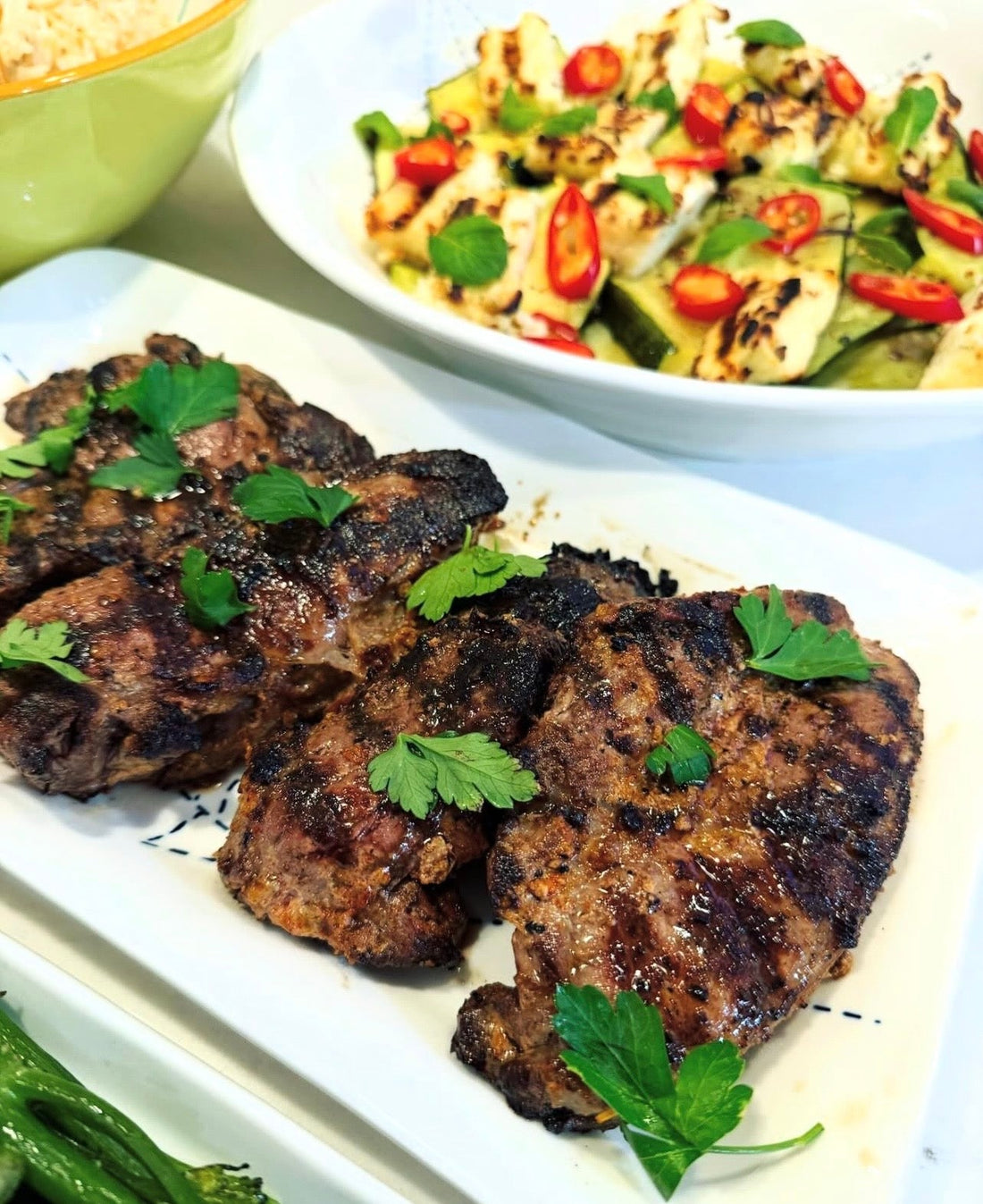 Harissa Marinated Organic Lamb Steaks with Courgette & Halloumi Salad