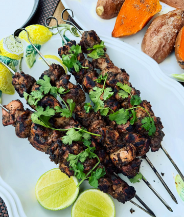 Organic Jerk Chicken Kebabs with Roasted Sweet Potatoes & Charred Corn Mango Salad