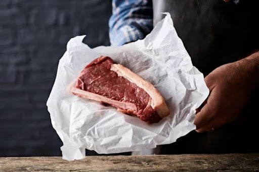 The best way to cook sirloin steak in a pan with a raw sirloin steak on bone.
